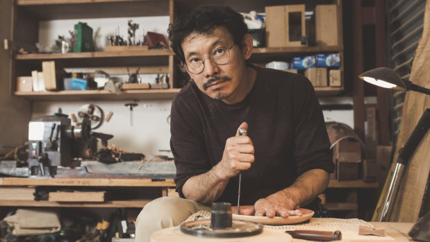 Hiroshi Yamaguchi, founder of KOITOYA designs, uses Canberra street trees and Japanese sustainable hardwood in many of his pieces.