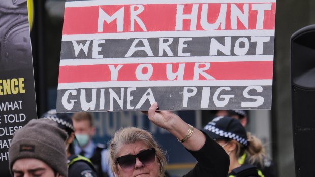 An anti-vaccination protest at Health Minister Greg Hunt’s office on Saturday.