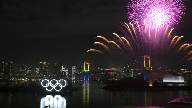 Fireworks light up Tokyo for the six-month countdown but the coronavirus outbreak has become an immense headache for organisers.