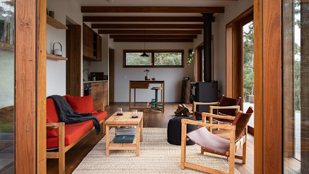 Mill Cabin, embracing off-the-grid living in sub-alpine woodlands.