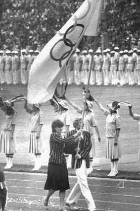 The Australian team carry the Olympic flag during the Opening Ceremony.