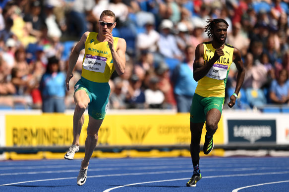 Australia’s Steve Solomon and Jamaica’s Anthony Cox in the heats of the men’s 400 in Birmingham.