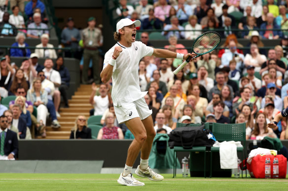 Alex de Minaur celebrates after beating Arthur Fils of France in the fourth round.