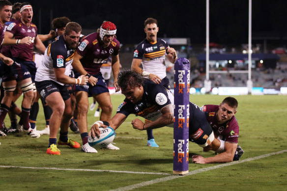 Jahrome Brown of the Brumbies touches the line with his foot as he attempts to score a try during the round five match.