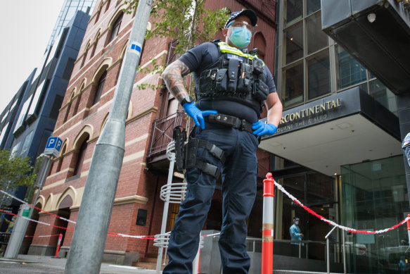A police officer outside a quarantine hotel in Melbourne in April.