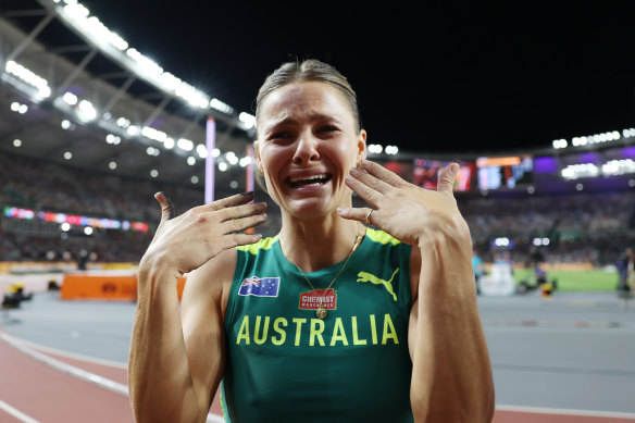 Overcome with emotion, Nina Kennedy celebrates her gold medal.