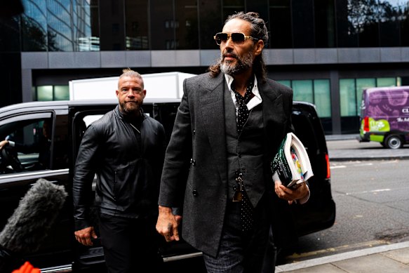 Russell Brand arrives at the Southwark Crown Court on Thursday (UK time).