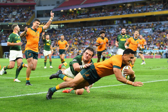 Len Ikitau scores a try during last year’s 30-17 victory over the Springboks in Brisbane.
