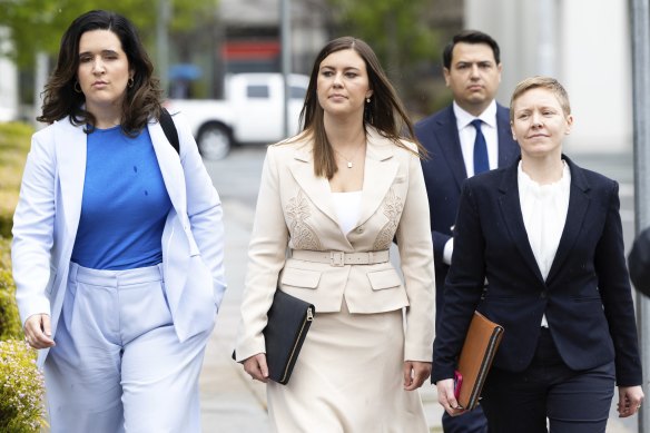 Brittany Higgins (centre) arrives at the ACT Supreme Court in Canberra on Wednesday.