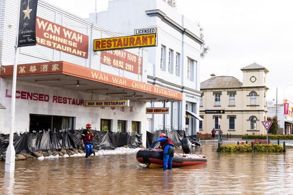 Emergency crews along flooded streets in Forbes, NSW, on Wednesday.