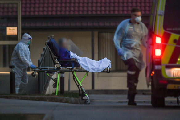 A resident being evacuated from St Basil’s nursing home last July. The facility suffered one of Victoria’s deadliest COVID-19 outbreaks.