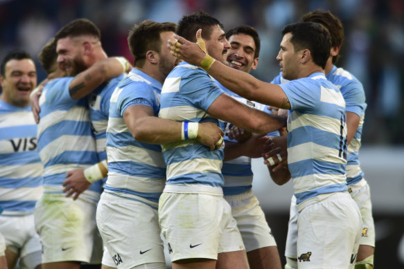 Argentina's players celebrate after beating Scotland.