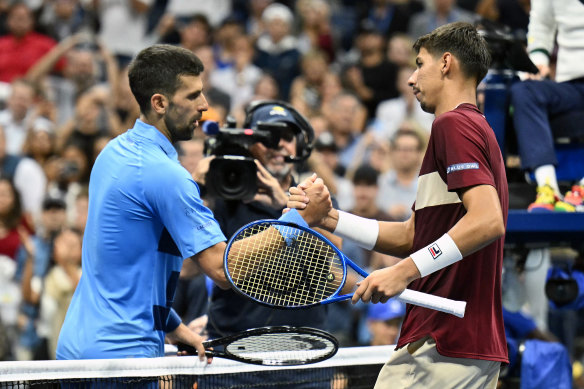 Novak Djokovic congratulates Popyrin after his win against him at last year’s US Open.