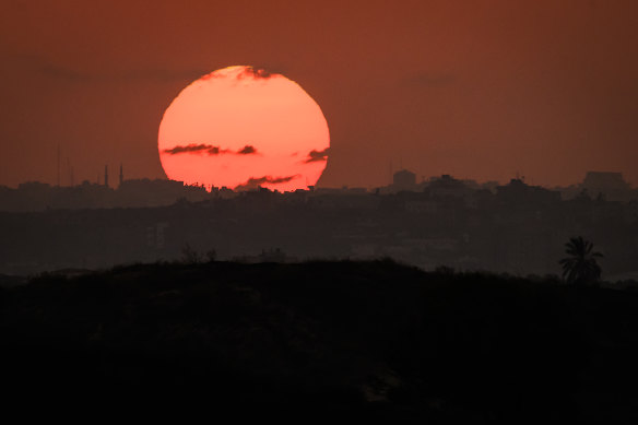 The sun sets over Israel. Hundreds of thousands of residents of northern Gaza have fled to the southern part of the territory, following Israel’s vow to launch a ground invasion. 