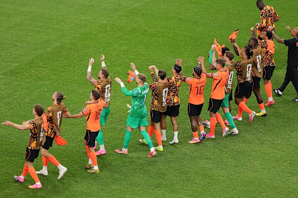 The players salute their supporters in Houston.