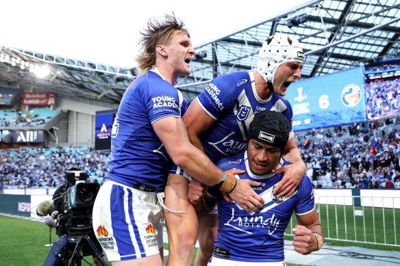 Stephen Crichton celebrates his try.