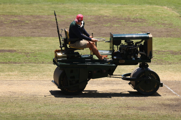 Ground staff go to work during lunch on day five.