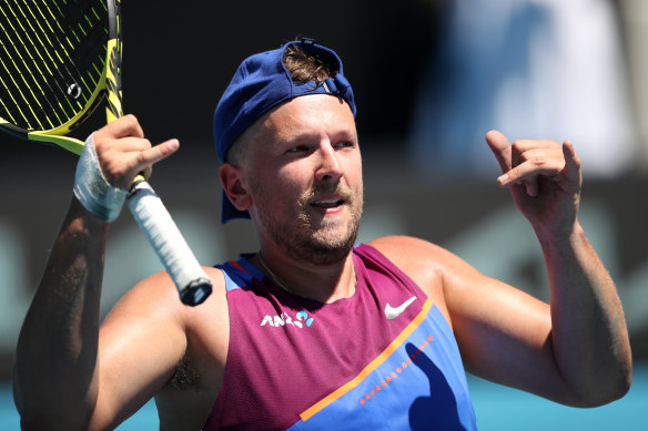 Alcott celebrates match point in his semi-final win in the Australian Open on Tuesday.