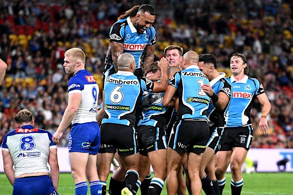 The Sharks celebrate Hohepa Puru’s try against Canterbury.