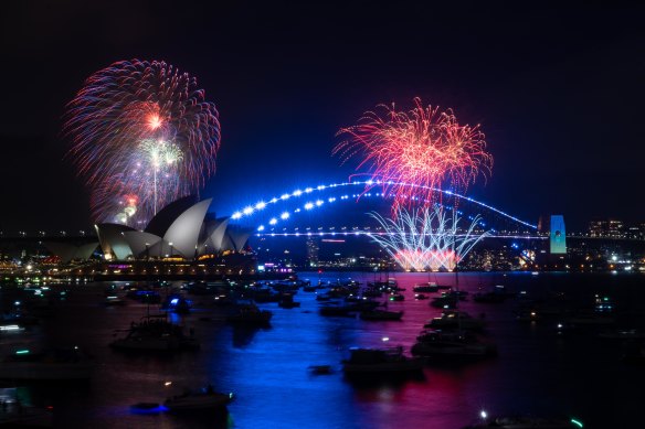 Fireworks light up the skies above Sydney Harbour at 9pm on New Year’s Eve.