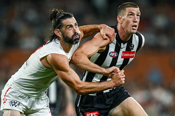 Darcy Cameron (right) up against former Collingwood star Brodie Grundy, now at Sydney.