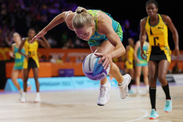 Kate Moloney dives to keep the ball in play against Jamaica.