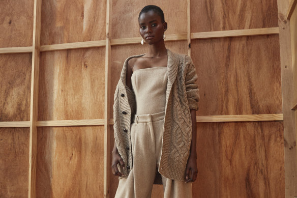 R.M. Williams cardigan, $199. Jacinta James bustier, $1100, and pants, $1100. Reliquia “Cocoon” pearl earrings, $199 (worn throughout). Christian Dior loafers, $1390. 