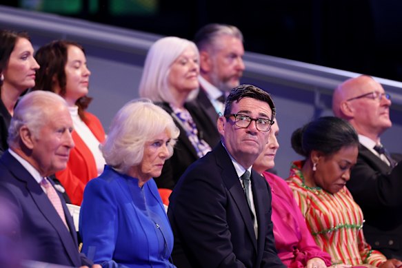 Prime Minister Andy Burnham watches the Commonwealth Games opening ceremony from the royal box in Glasgow on Thursday. 