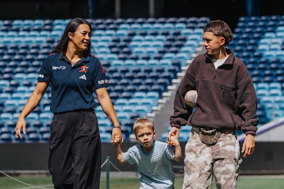 Corban Baxter with her sons Carter (right) and Beauden (middle). 