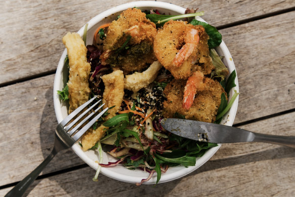 Greg Mullins ate take away salt and pepper squid and coconut prawn salad  from Seachange Cafe in Dee Why. 