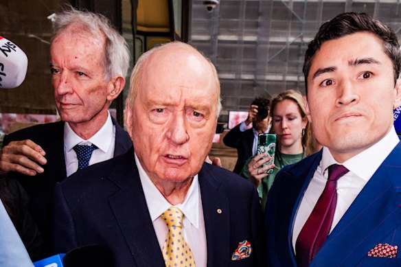 Former broadcaster Alan Jones and his lawyer Bryan Wrench (right) at a court appearance in December last year.