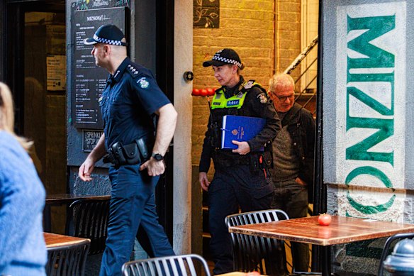 Police at Miznon on Saturday.