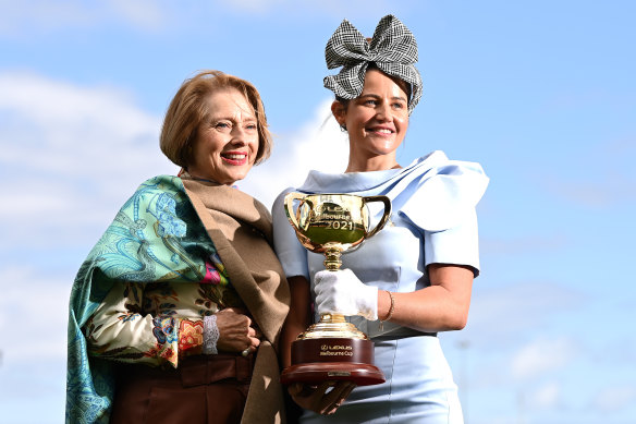 Gai Waterhouse (left) pictured with Michelle Payne and the Melbourne Cup.