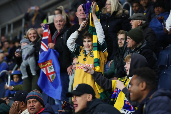 A supporter in a Wallabies jersey at the Australia and Fiji match. 