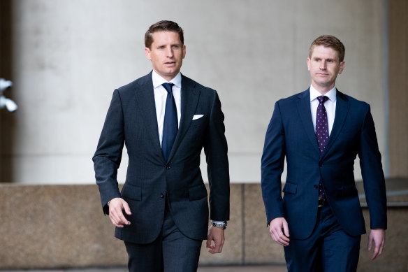 Assistant Defence Minister and federal Liberal MP Andrew Hastie (left) outside the Federal Court on Friday.