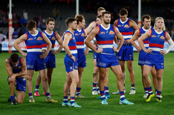 The Western Bulldogs look dejected after a loss during the round 5 match against the Essendon Bombers.