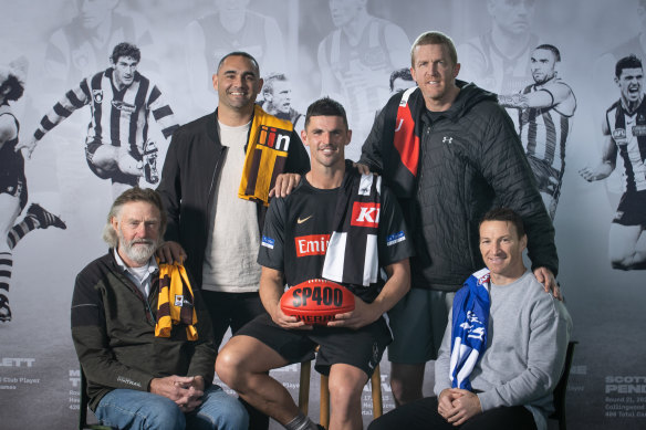The 400 club (from left): Michael Tuck (426 games), Shaun Burgoyne (407), Scott Pendlebury (400th game on Saturday night), Dustin Fletcher (400) and Brent Harvey (432). Only Kevin Bartlett (403), who was unavailable, was missing from the exclusive club this week.