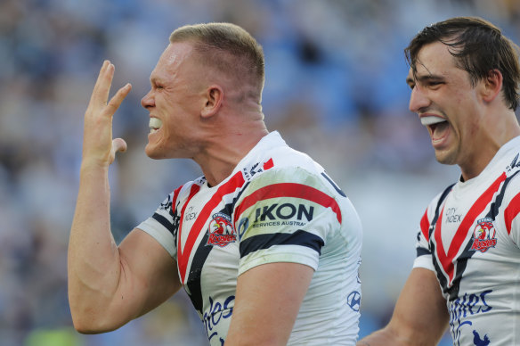 Roosters prop Lindsay Collins celebrates his first-half try.