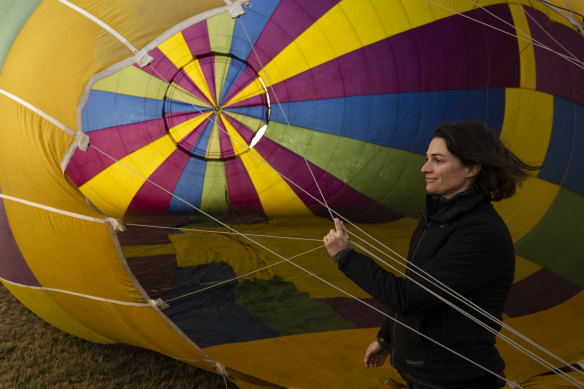 Hot air balloon pilot Nicola Scaife prepares for her last practice flight in the Hunter Valley before the championships next week.