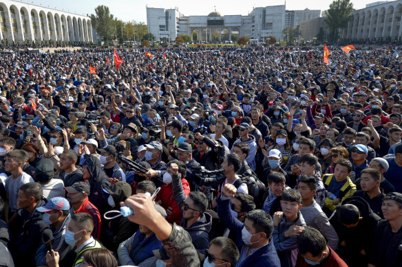 People protest during a rally against the results of a parliamentary vote in Bishkek, Kyrgyzstan, on Monday.