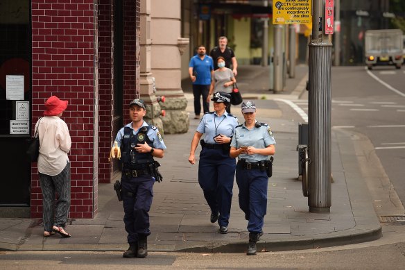 NSW Police patrolling near the Sydney CBD soon after the public health orders took effect.