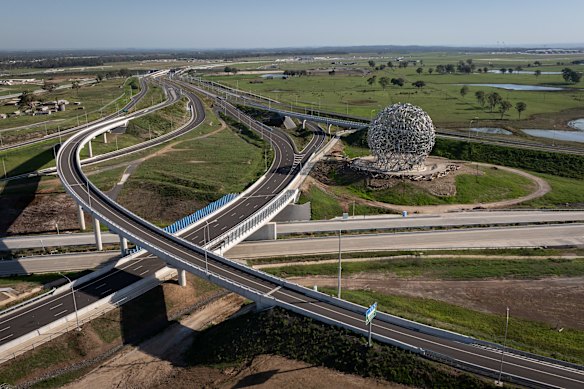 A spaghetti junction of ramps link the M12 motorway to Western Sydney Airport, next to the Great Emu in the Sky sculpture.