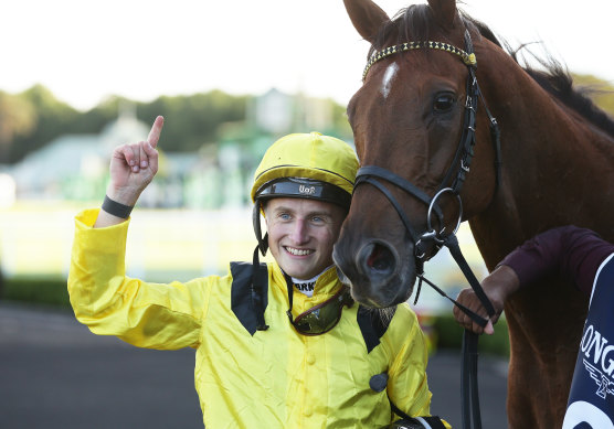 English jockey Tom Marquand with Addeybb after winning the Queen ELizabeth Stakes last year