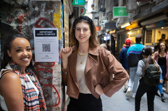 Melbourne visitors Indigo Collins and Oksana Lutak have found Victoria’s multiple QR code systems difficult to navigate.