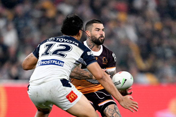 Adam Reynolds passes the ball during the Broncos' win over the North Queensland Cowboys at Suncorp Stadium on Friday. Reynolds played three seasons under Dolphins coach Bennett at South Sydney.