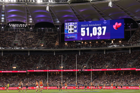 The match attendance is displayed on the scoreboard.