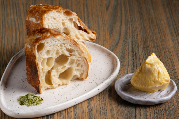 Dark-crusted slices of house-made bread with kefir and miso butter.