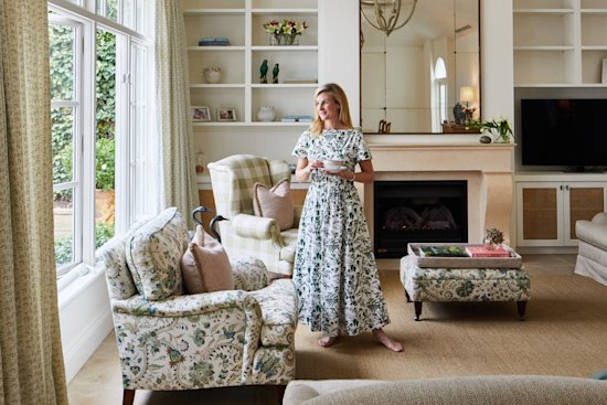 “I love the sense of space the pitched roof gives the room,” says Monique. “The armchairs were custom made in imported fabrics by decorator Adelaide Bragg.”
