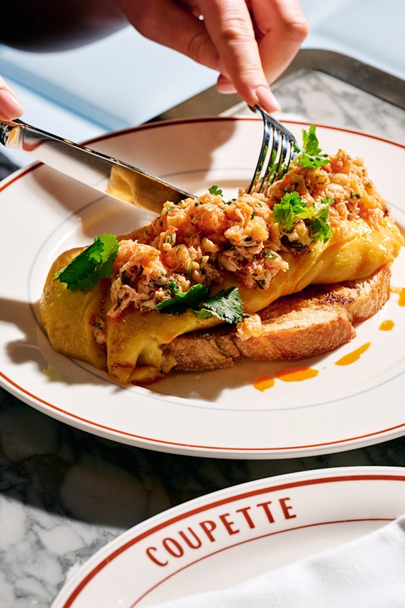 Breakfast dishes include a crab omelette with chilli and coriander.