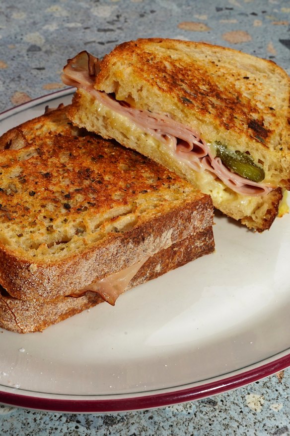 A classic from the sandwich bar: sourdough toastie with ham, cheese and pickles.